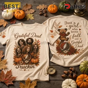 Grateful Dead Fall Dancing Bear T-Shirt pair on wood table with pumpkins, autumn leaves, and the band members graphic.