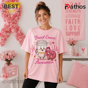 Dunkin Donuts Breast Cancer Awareness Pink T-Shirt 3 Dunkin Donuts Breast Cancer Awareness Pink T-Shirt featuring a cartoon coffee cup, donut, and pink ribbon illustration.