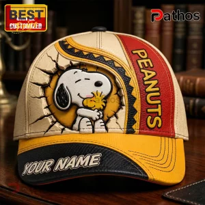 Peanuts Snoopy and Woodstock Personalized Leather Cap 2 Peanuts Snoopy and Woodstock Personalized Leather Cap with yellow brim, cracked wall design, and custom name placement.