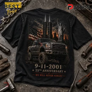 Patriotic 9/11 Memorial Pickup Truck Anniversary T-Shirt 2 Patriotic 9/11 Memorial Pickup Truck Anniversary T-Shirt featuring a black truck, Statue of Liberty, and twin tower lights.