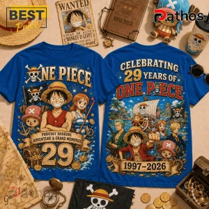 One Piece 1997-2026 Anniversary Blue T-Shirt featuring Luffy, Nami, and Chopper graphics on a vibrant blue cotton fabric.