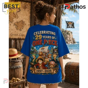 One Piece 1997-2026 Anniversary Edition T-Shirt featuring Luffy and crew graphics on a vibrant blue cotton garment.