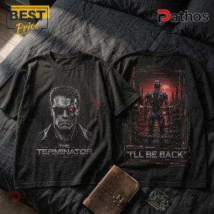 The Terminator Premium Black Shirt featuring a front cyborg print and rear robotic skeleton graphic on a dark textured bed.