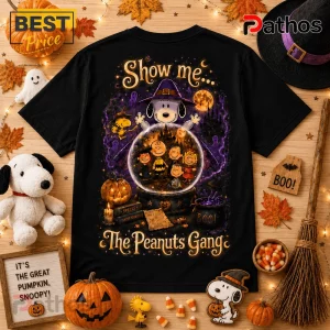 The Peanuts Gang Snoopy Halloween black T-shirt featuring a crystal ball with characters, a witch hat, and purple accents.