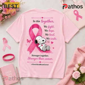 Snoopy Breast Cancer Awareness Pink T-Shirt 2026 2 Snoopy Breast Cancer Awareness Pink T-Shirt 2026 featuring a cartoon Snoopy character, pink ribbon, and inspirational text.