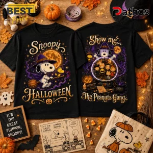 The Peanuts Gang Snoopy Halloween black T-shirt featuring Snoopy on a broomstick and the full cast in a crystal ball.