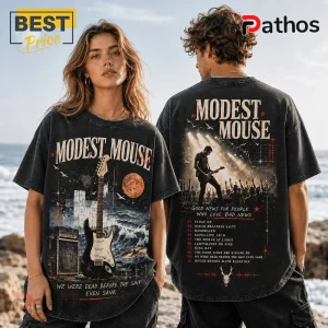Modest Mouse Good News for People Who Love Bad News shirt featuring black vintage wash fabric and band concert graphics.