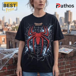 Spider-Man Brand New Day black t-shirt featuring a large red spider emblem, white webs, and lightning on a rooftop background.