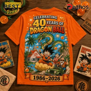 Dragon Ball 1986-2026 Anniversary Orange T-Shirt 2 Dragon Ball 1986-2026 Anniversary Orange T-Shirt featuring Goku, Bulma, and Master Roshi with Shenron on a tropical beach.