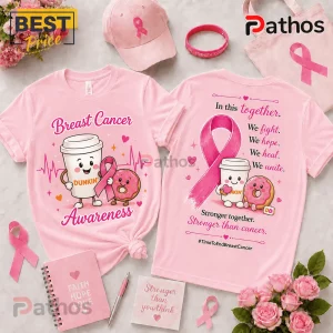 Dunkin Donuts Breast Cancer Awareness pink t-shirt with coffee cup, donut, and ribbon graphics on a flat-lay background.