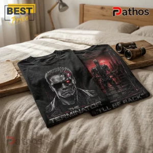 The Terminator Premium Black Shirt 1 The Terminator Premium Black Shirt featuring a detailed T-800 cyborg graphic with red glowing eye and text on fabric.