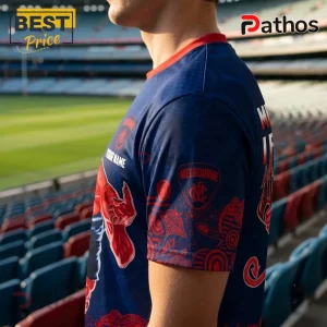 Melbourne Football Club Personalized Demon Mascot T-Shirt 2 Melbourne Football Club Personalized Demon Mascot T-Shirt with navy blue fabric, red trim, and indigenous art patterns.