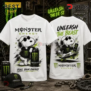 Monster Energy x Snoopy Unleash The Beast T-Shirt with white fabric, Snoopy wearing sunglasses, and neon green logo graphics.