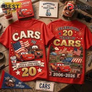 Disney Pixar Cars 20th Anniversary Red T-Shirt featuring Lightning McQueen, Mater, and Radiator Springs graphic prints.